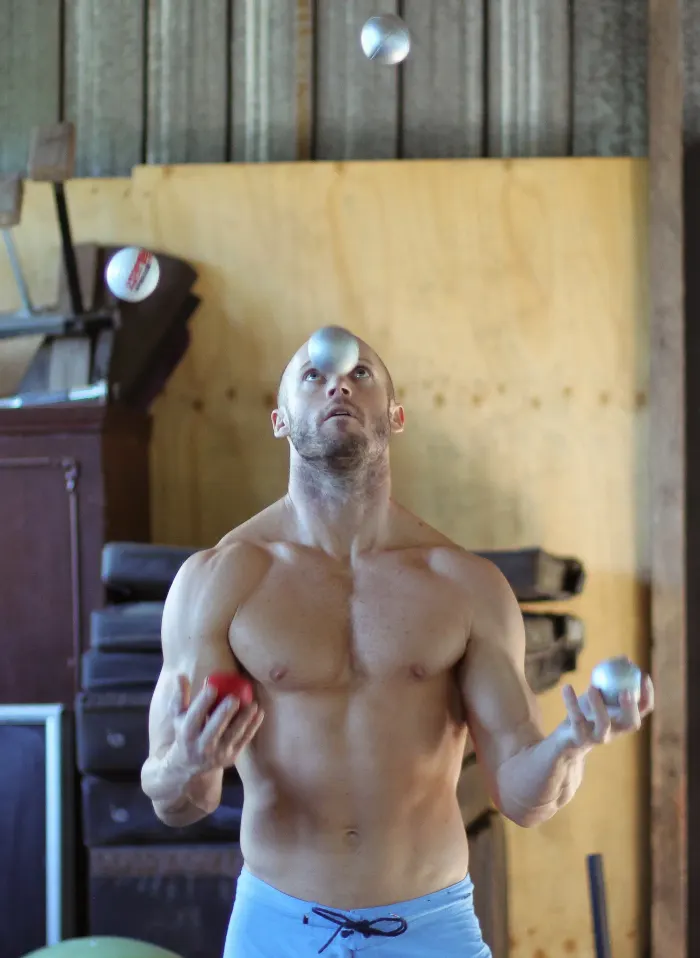 Keegan Smith juggling in his training shed